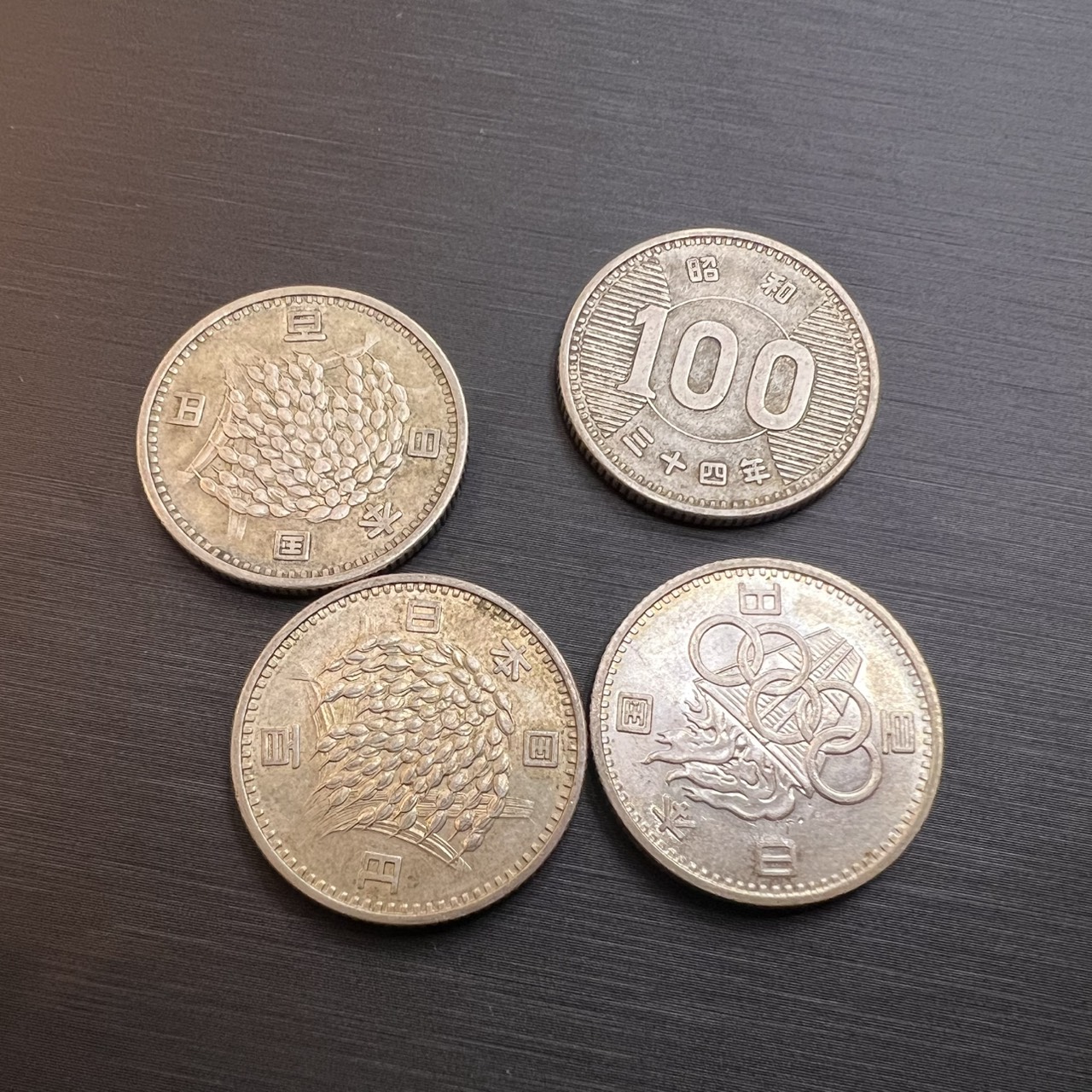 100円銀貨 稲穂・鳳凰・オリンピック絵柄の買取実績